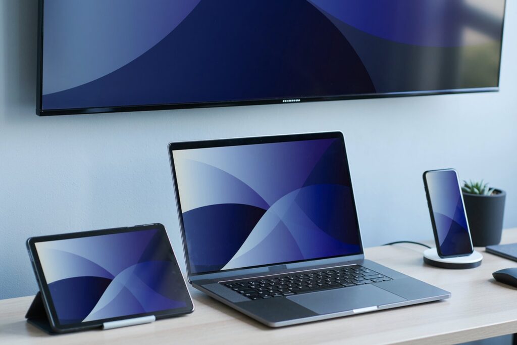 TV, laptop, tablet and phone showing the same campaign across screens