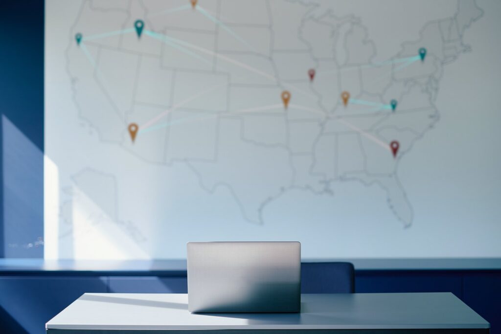 Wall map with pins and lines mapping ad placements
